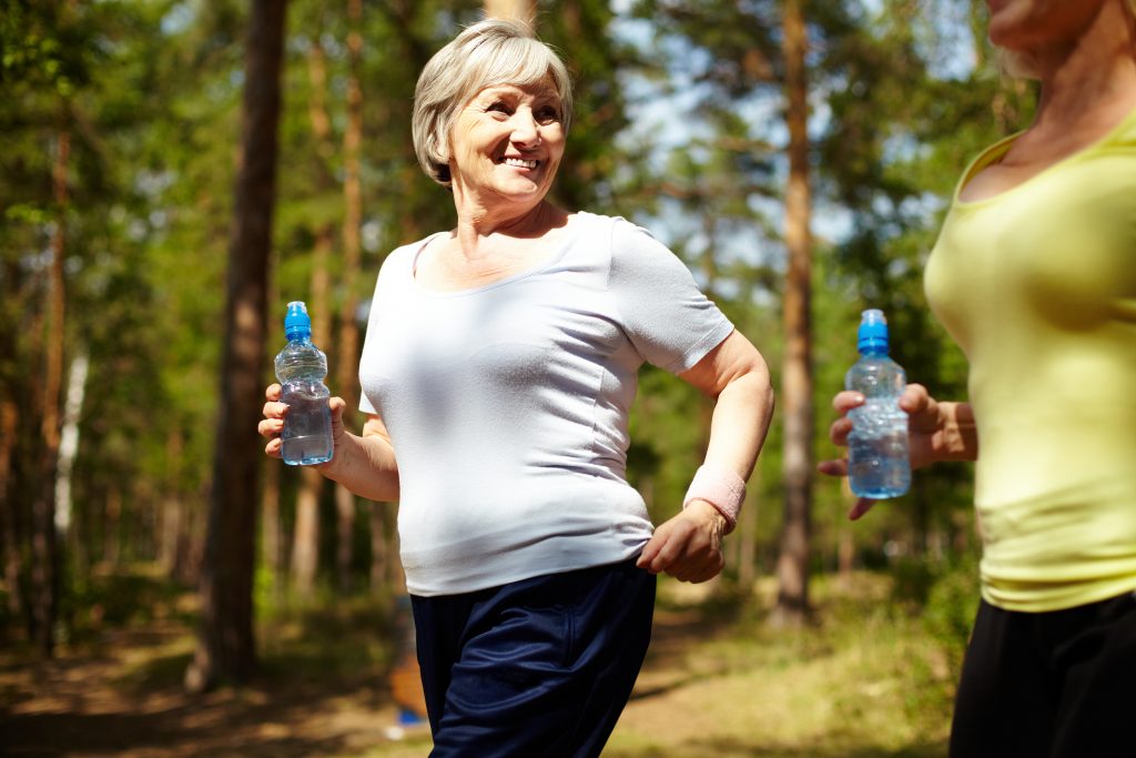 Seniors enjoying a walk in the park