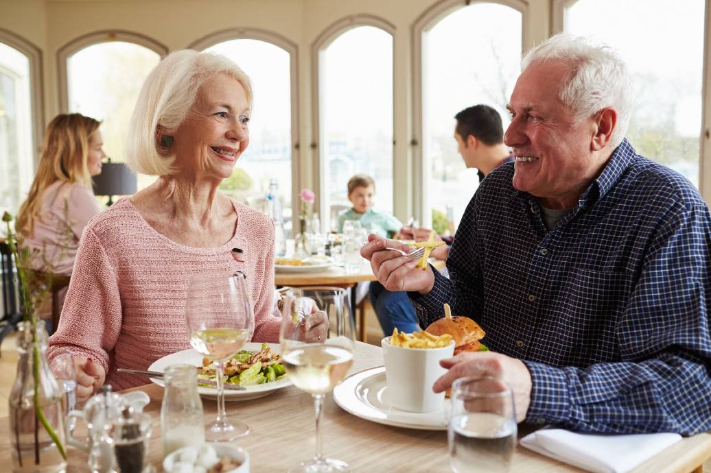 Senior couple eating at a restaurant