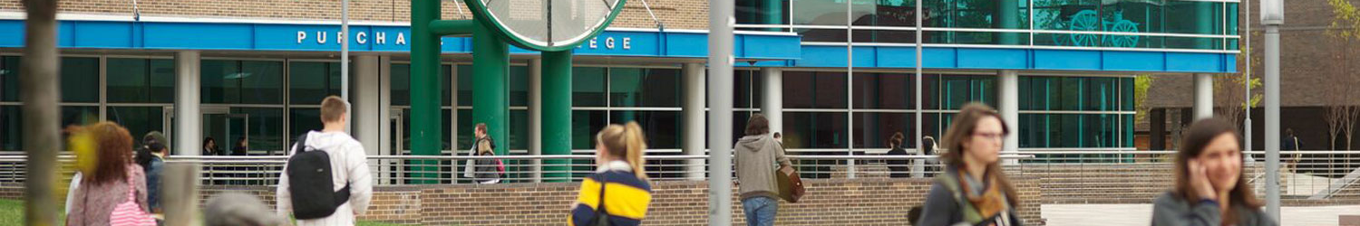 Students walking on campus at Purchase College