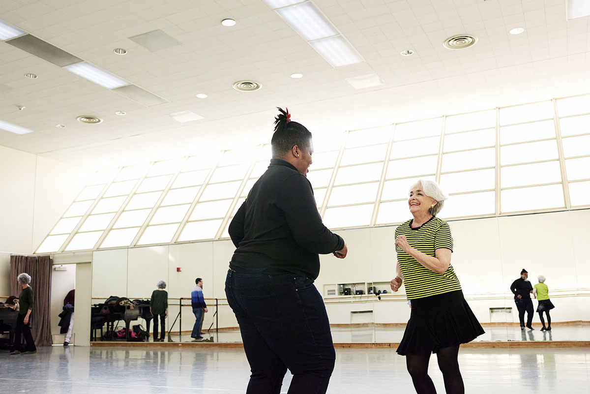 Senior Woman doing the salsa with Ken