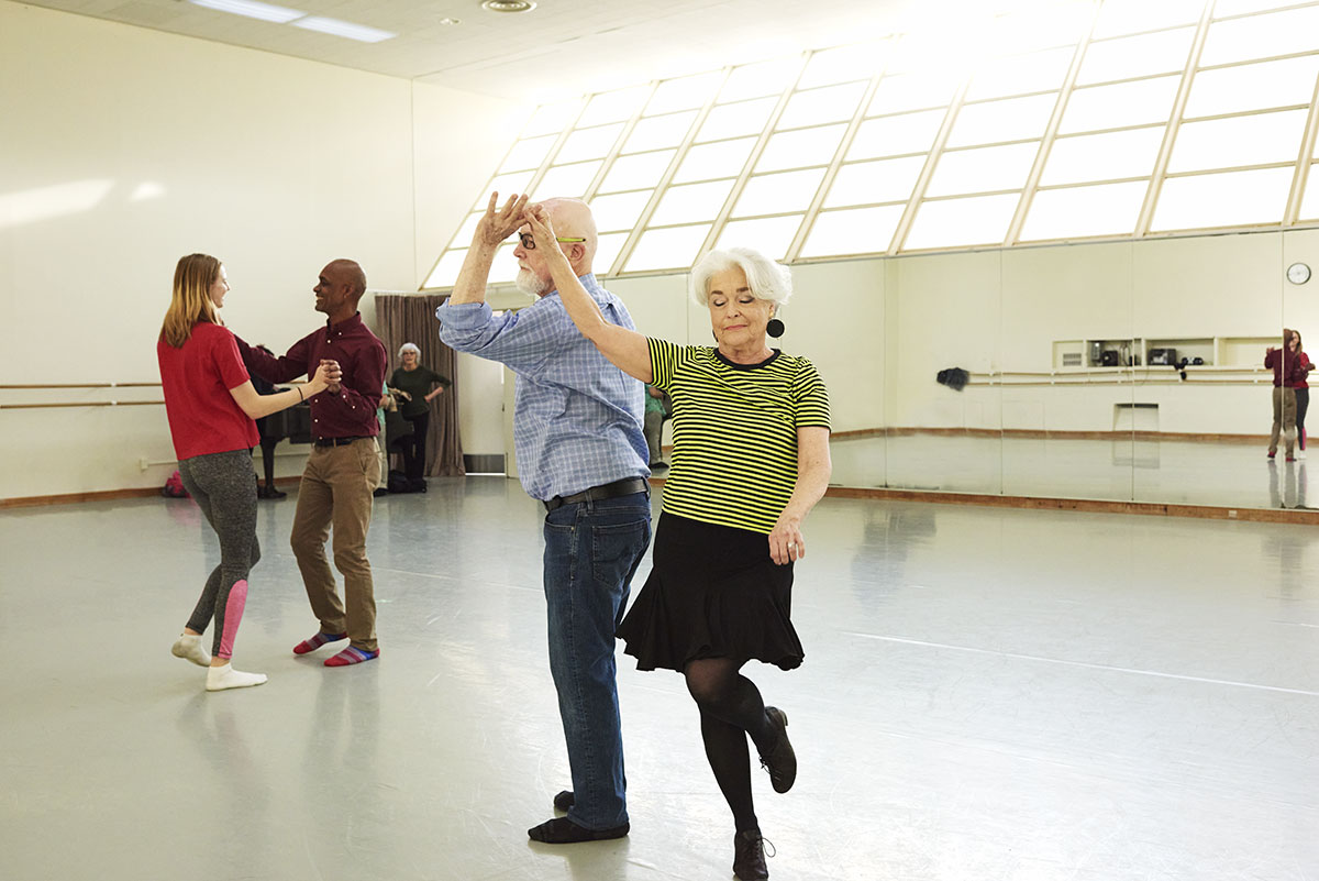 Senior couple taking a dance class